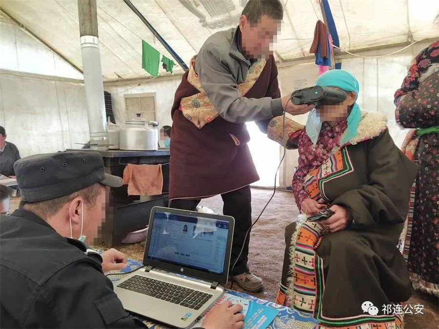 Police collect iris scans from an elderly woman. 