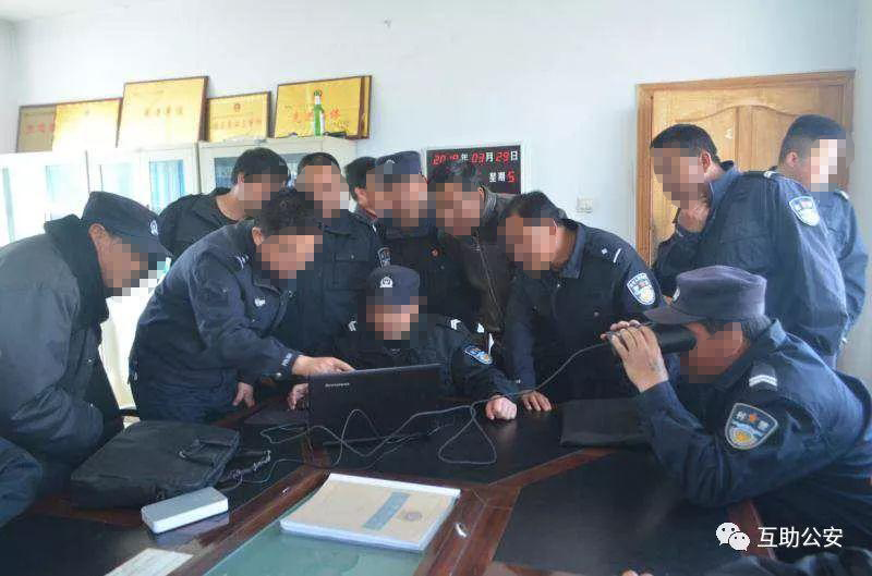 Police officers practice using iris recognition software and hardware.