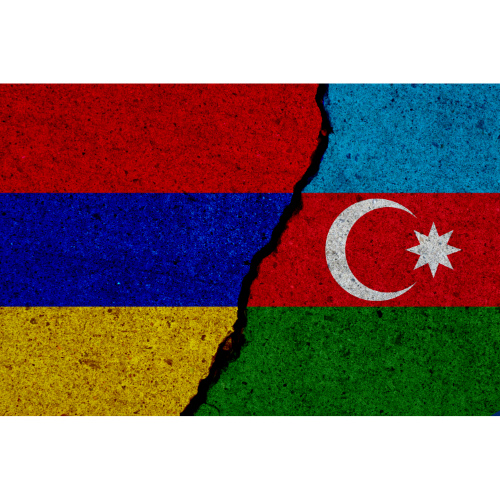 Flags of Armenia and Azerbaijan on a cracked wall.