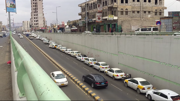 Figure 4: Long line of taxis waiting for gas to be available at a gas station in the city of Sana’a. (Photo credit: Naser Noor)