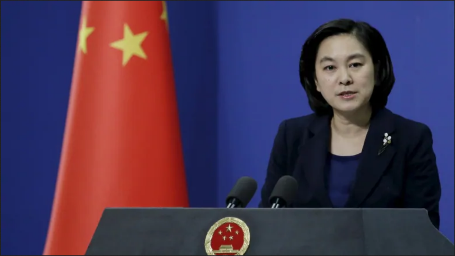 Chinese Foreign Ministry Spokesperson Hua Chunying conducting a daily briefing